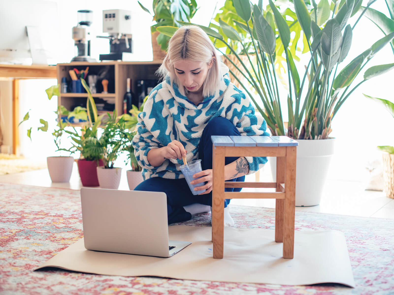 woman painting a table