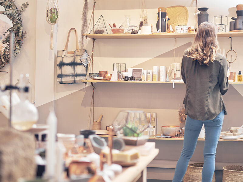 Woman looking at home decor.