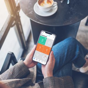 Woman using PropertyMe property manager app